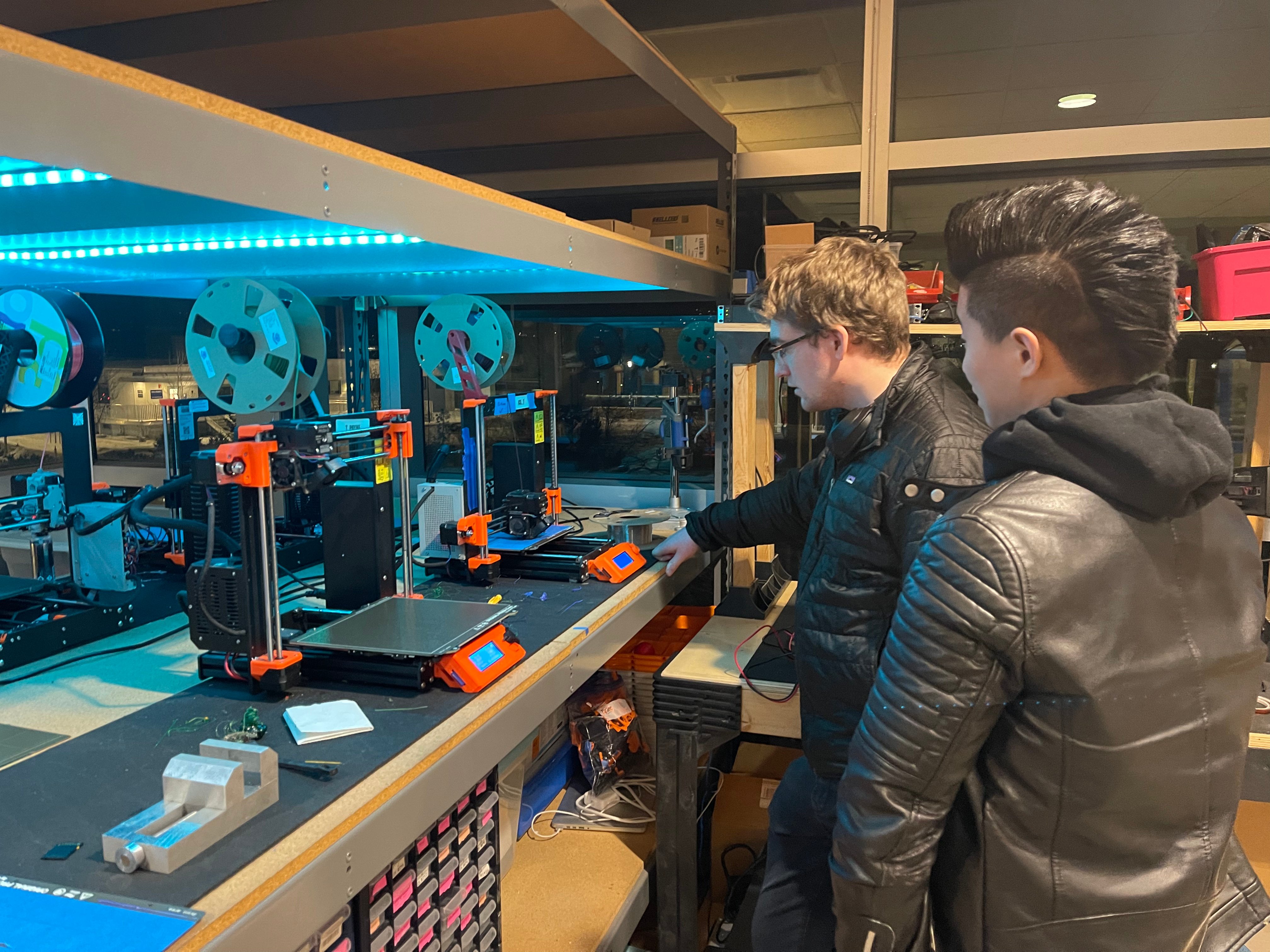 Andre Cox at work with a colleague